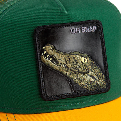The Farm’s The Oh Snap Alligator cap features green and yellow colors, a black patch with an embroidered crocodile head, and "OH SNAP" text in the upper right corner. All sales final.