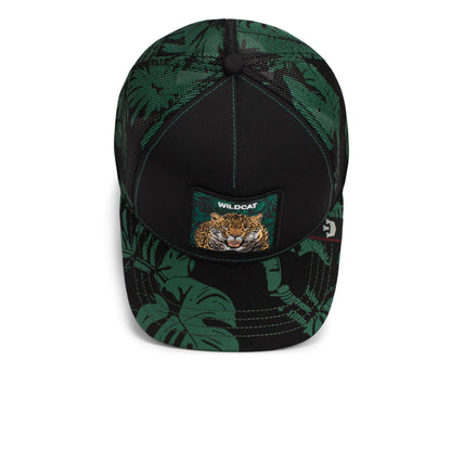 The Farm Slash black and green baseball cap features a tropical leaf pattern and a wildcat face patch with "WILDCAT" on the front. All sales are final.