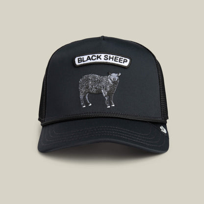 The Farm's GB2 Black Sheep trucker hat features a BLACK SHEEP patch above an illustrated sheep, shown on a plain light background—a perfect pick for fans of custom mods or finely tuned engine spirit.