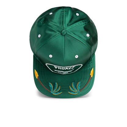 The Goorin Bros. Yolo is a green satin Phuket hat with white eyelets, a PHUKE patch on the front, and yellow-green embroidered brim—ideal for adding island vibes to any adventure.