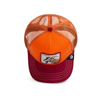 Orange and red trucker hat by The Farm, called Greatest Grazer, with a mesh back and front patch featuring an animal graphic and "G.O.A.T." All sales are final.