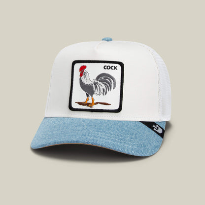 The Goorin Bros. Rooster Fan Institution Ball Club cap features a white and light blue trucker design with an embroidered rooster and "COCK" on the front—perfect for bold, game-day style.