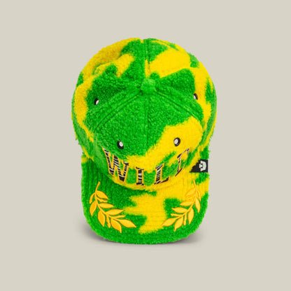 The Loose Cannon by Goorin Bros. is a neon green sherpa-textured baseball cap featuring "WILL" in jungle lettering on the front and yellow laurel leaf embroidery near the brim.