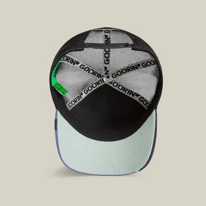Top view inside the Goorin Bros. Means Yes hat reveals black mesh, Goorin-branded inner bands, a green tag, and a light blue brim underside—making it a standout accessory for any collection.