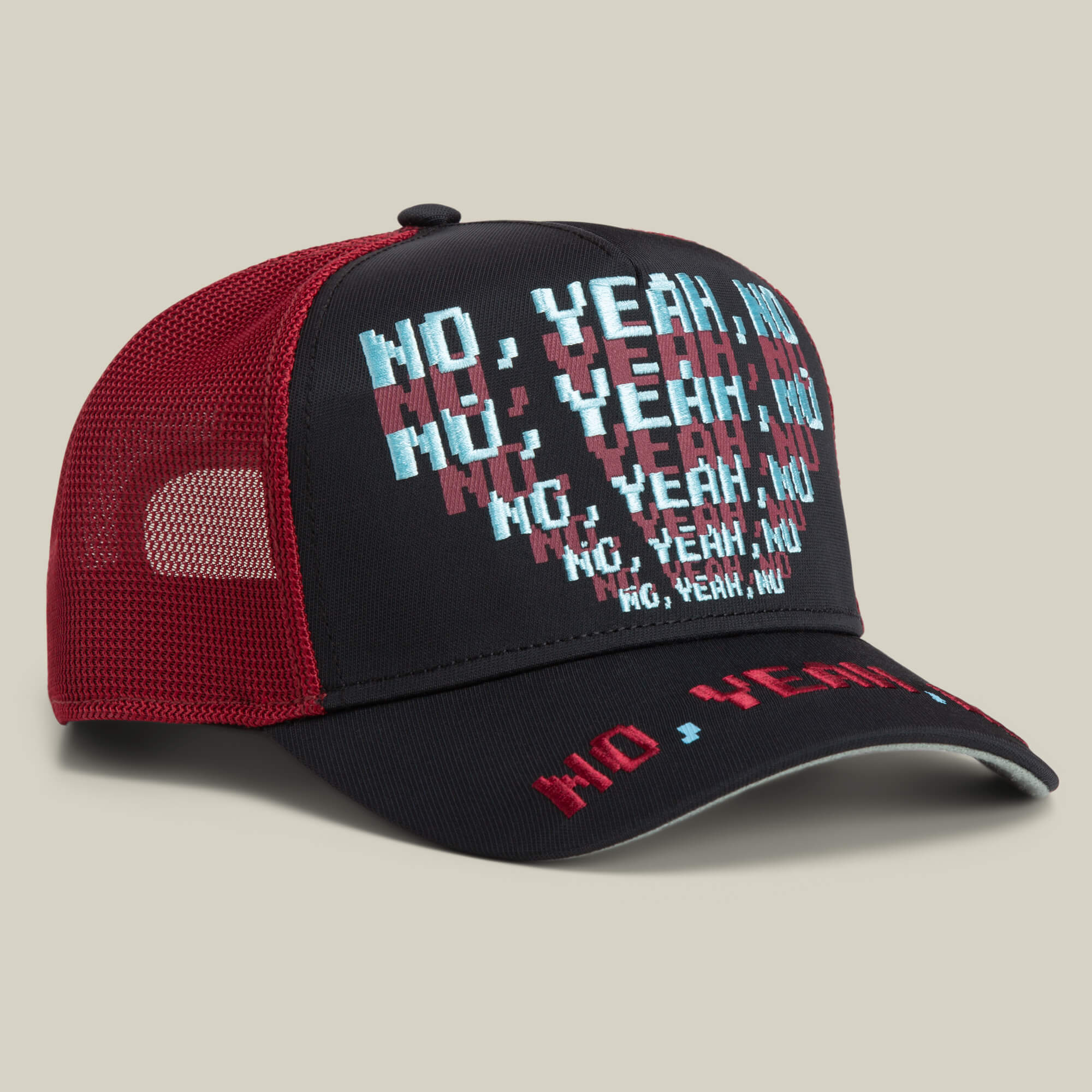 The Means No trucker cap by Goorin Bros. features black and red mesh with "NO, YEAH, NU" in pixelated blue and red text on the front and brim—ideal as a conversation starter hat for any casual style.