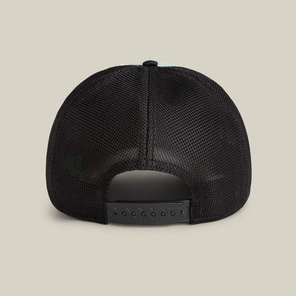 Back view of the Goorin Bros. Means Agreed black mesh trucker hat with an adjustable snapback, set against a beige background—pair it easily with your favorite casual shirt for laid-back style.