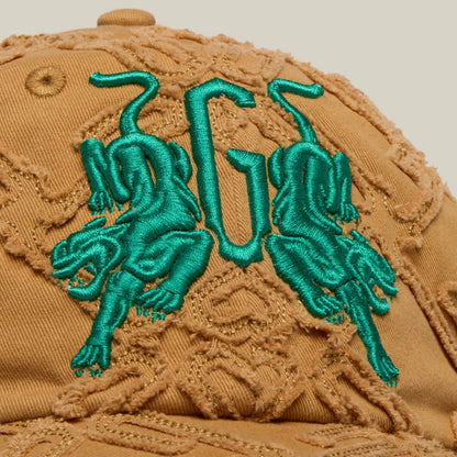 A tan textured Goorin Bros. "Future Baby Daddy" Papa Cap featuring two green embroidered tigers facing each other with a large G—an embroidered cap designed for main character energy.