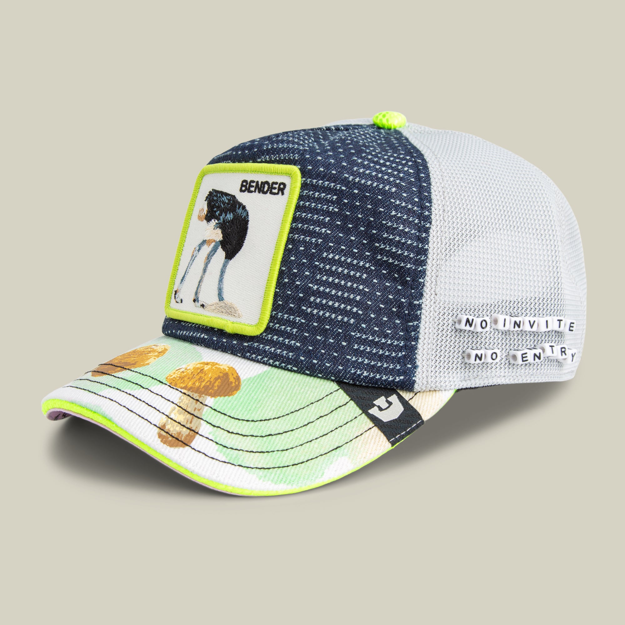 A mesh trucker cap and festival accessory, the Trance hat by Goorin Bros. features a “BENDER” patch with an ostrich, embroidered mushrooms on the bill, and “NO INVITE NO ENTRY” text on the side—perfect for any 128 BPM vibe.