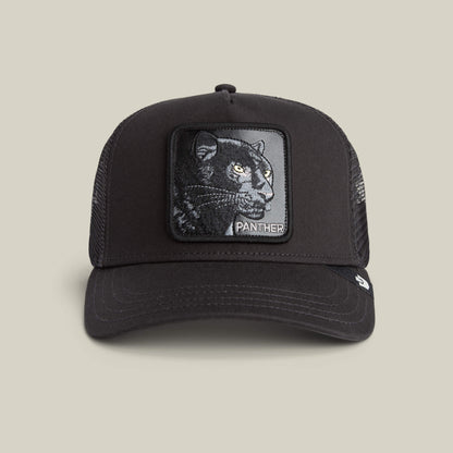 The Panther by Goorin Bros. is a stylish black mesh trucker hat featuring a front patch with an embroidered black panther and the word PANTHER.