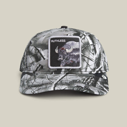 Front view of the Goorin Bros. Ruthless Camo baseball cap in monochrome camo, featuring a patch with a buffalo and "RUTHLESS" embroidered above it.
