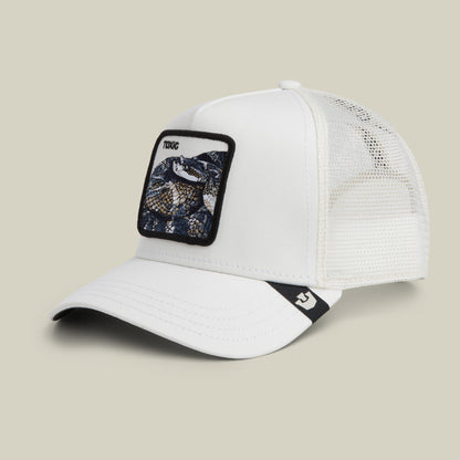 The Goorin Bros. Toxic Trucker is a white mesh trucker hat with a front patch showing an embroidered snake and "TOXIC," plus a black and white logo tag on the brim.
