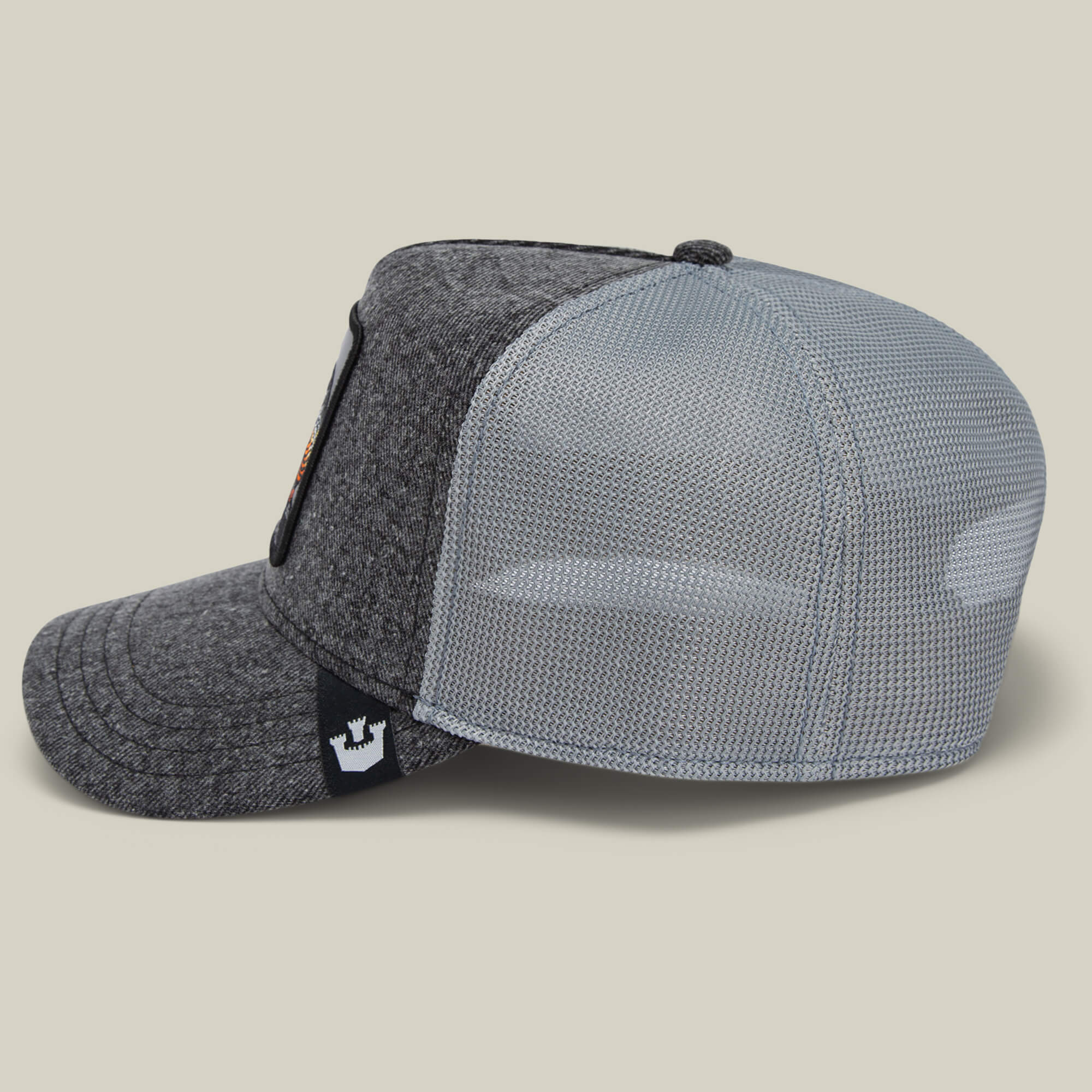The Mamba by Goorin Bros. is a standout hat with a dark gray fabric front and light gray mesh back, showcased from the side—ideal for those with a predator mindset.