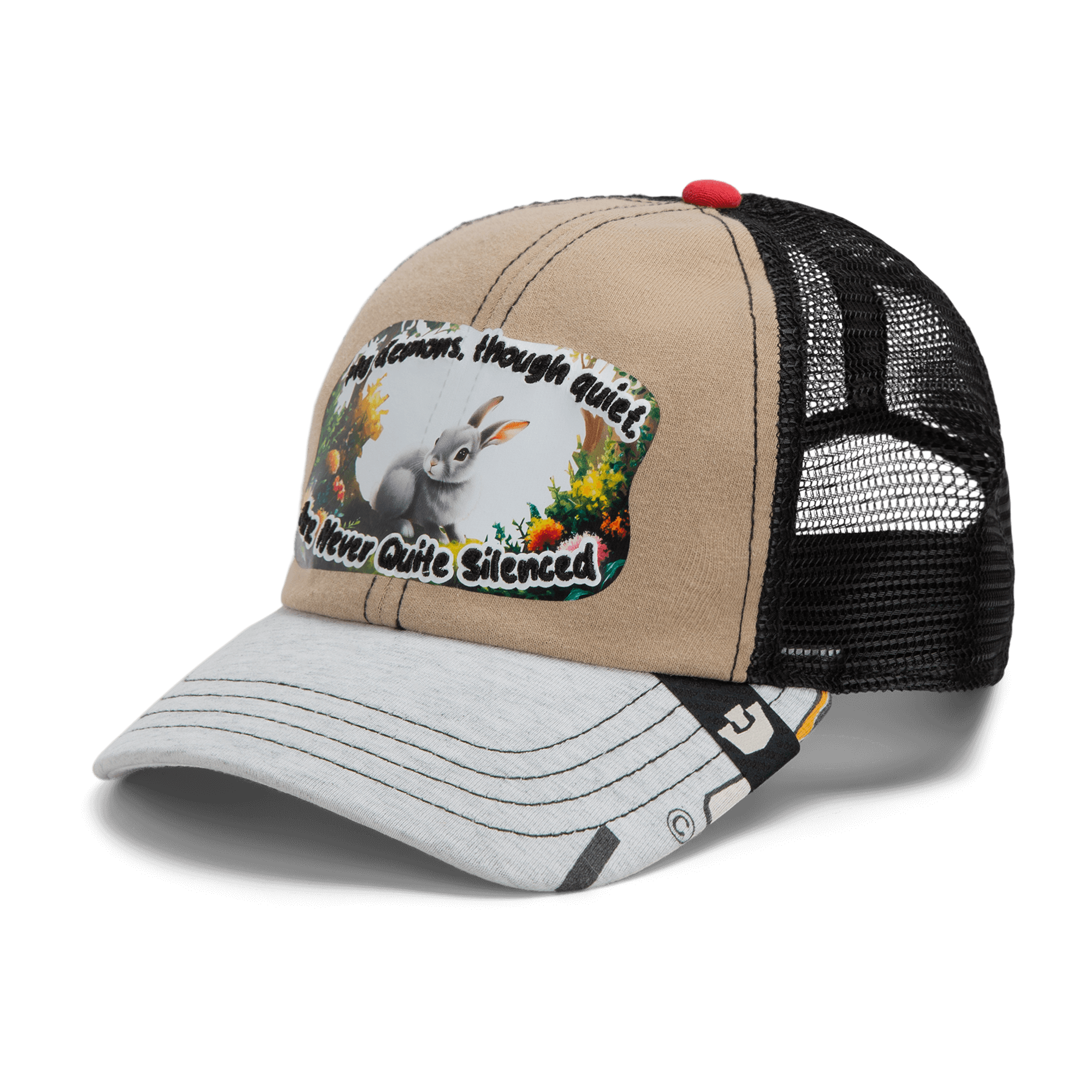 The Lil Ronin by Goorin Bros. is a beige and black mesh trucker hat with a rabbit and flowers patch. "The Flowers, though quiet, Are Never Quite Silenced" text accents this unique design from recycled tees.