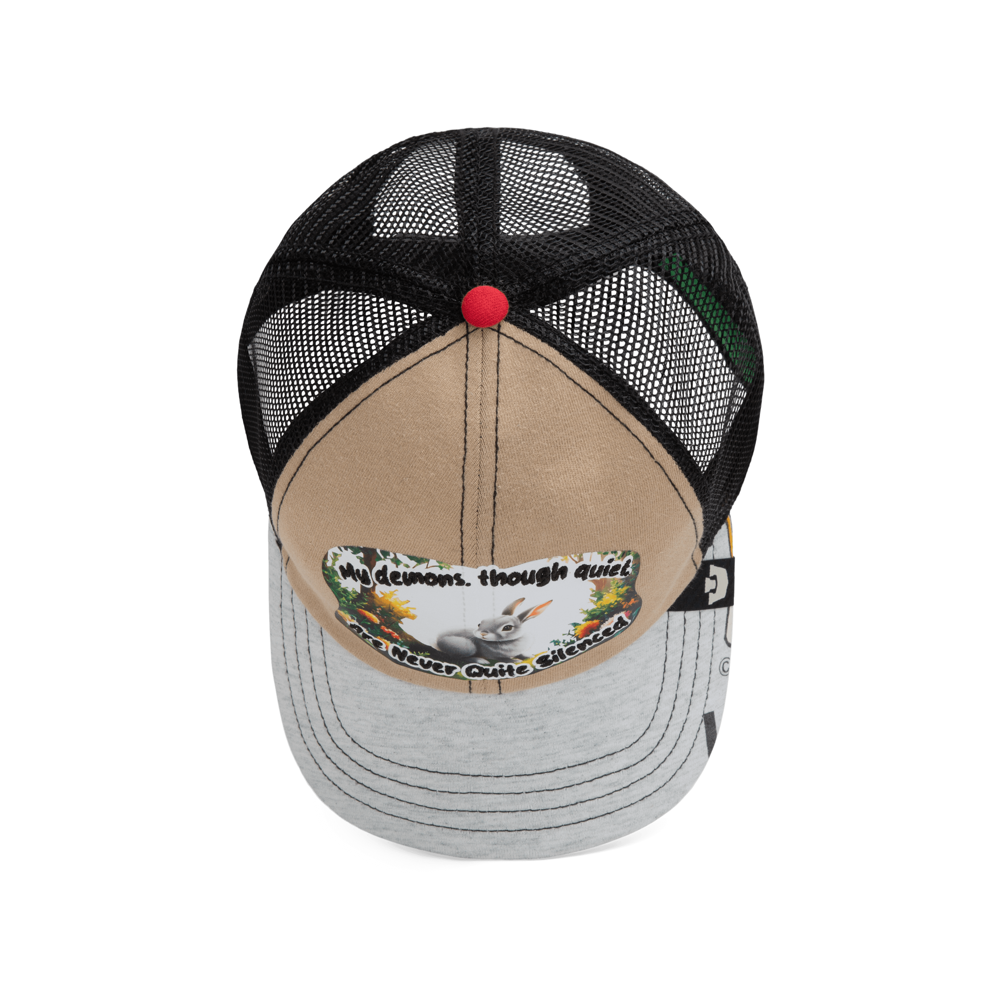 The Lil Ronin trucker hat from Goorin Bros.' Storybook collection features a tan and gray front, black mesh back, and a patch with text plus a graphic of a dog with flowers.
