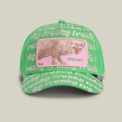 Goorin Bros. Freaky Friday hat in ENVY: a green mesh trucker with “freaky” text and front patch featuring a Sphynx cat and “FREAKY” on pink—a bold new drop for those ready to show their wild side.