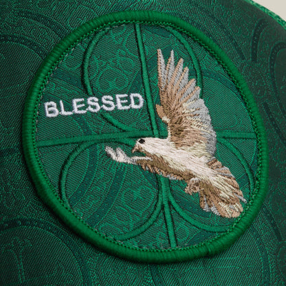 Add the Goorin Bros. Religulous - Blessed patch, featuring a green flying bird and "BLESSED" embroidery on a stylish textured background with a green border, perfect for your deep green hat.