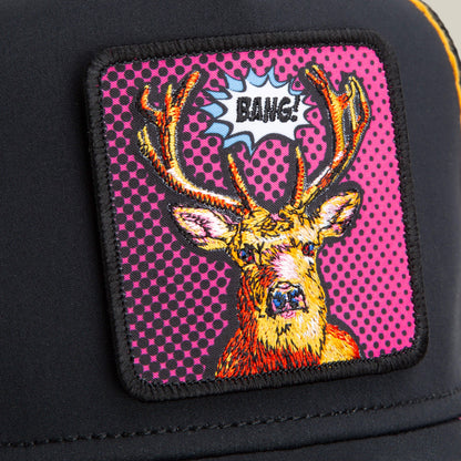 The Earned Media patch by Goorin Bros. features a stylized deer with antlers and a comic-style "BANG!" in a speech bubble over a pink and black Pop Art background with bold neon stitching.