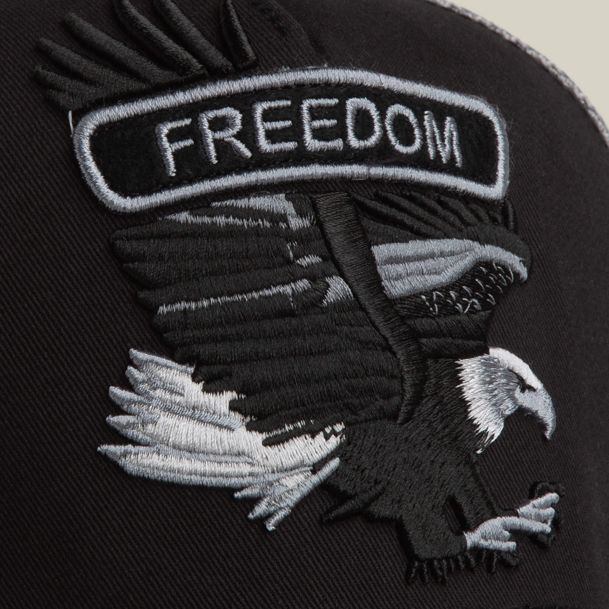 The Goorin Bros. Classic Rocker - Freedom patch features an embroidered bald eagle with outstretched wings and FREEDOM above, set on a dark fabric background.