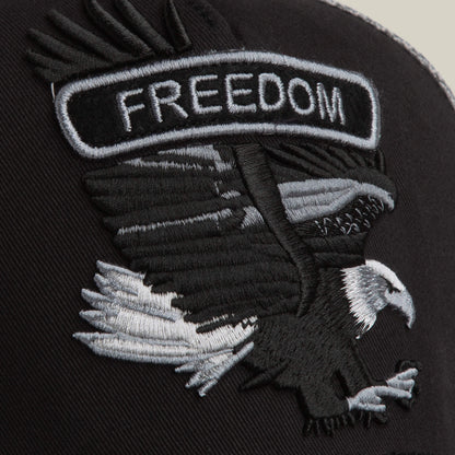 The Goorin Bros. Classic Rocker - Freedom patch features an embroidered bald eagle with outstretched wings and FREEDOM above, set on a dark fabric background.