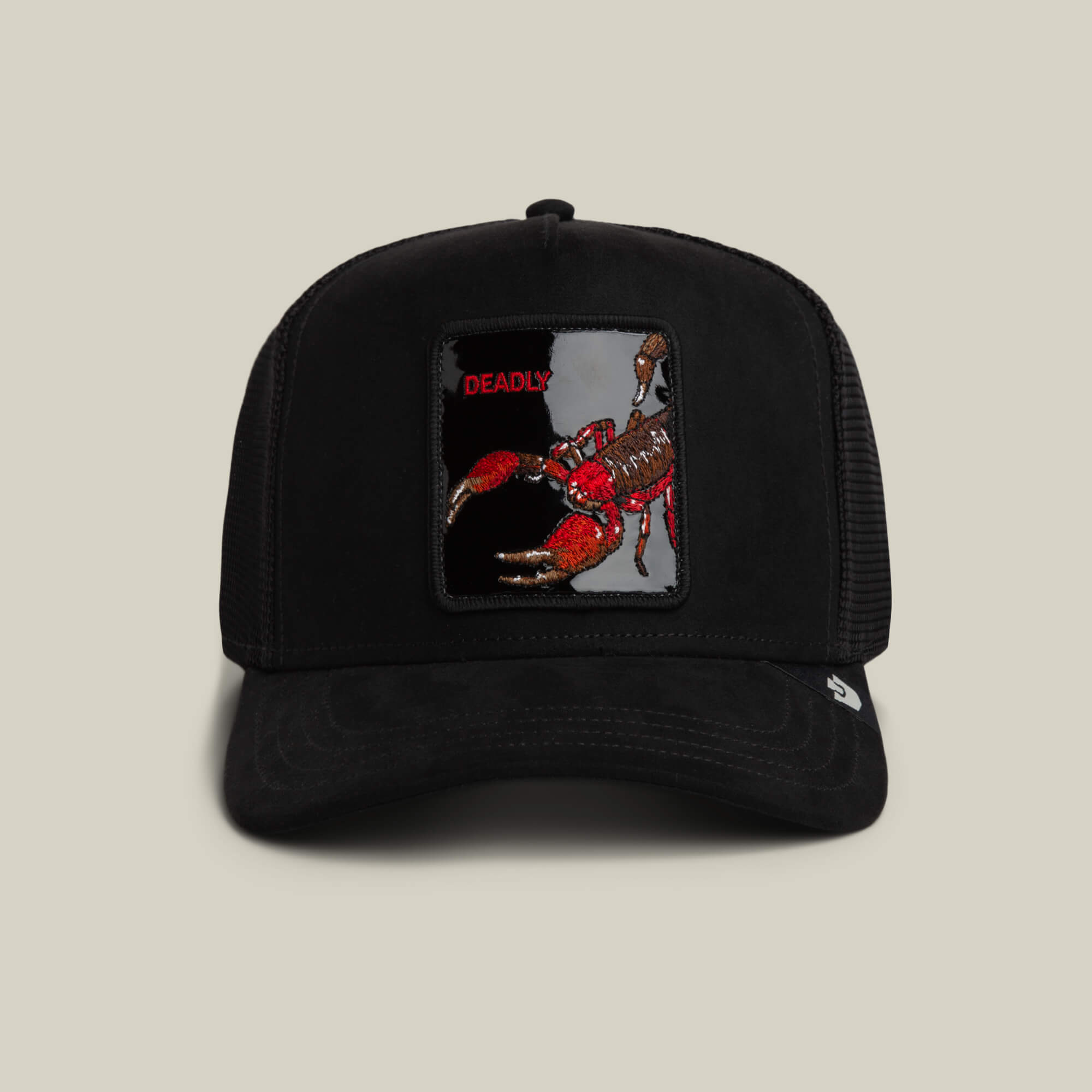 The Goorin Bros. Black Out Scorpion hat in VOID features bold red “DEADLY” text and a striking scorpion patch on black suede.