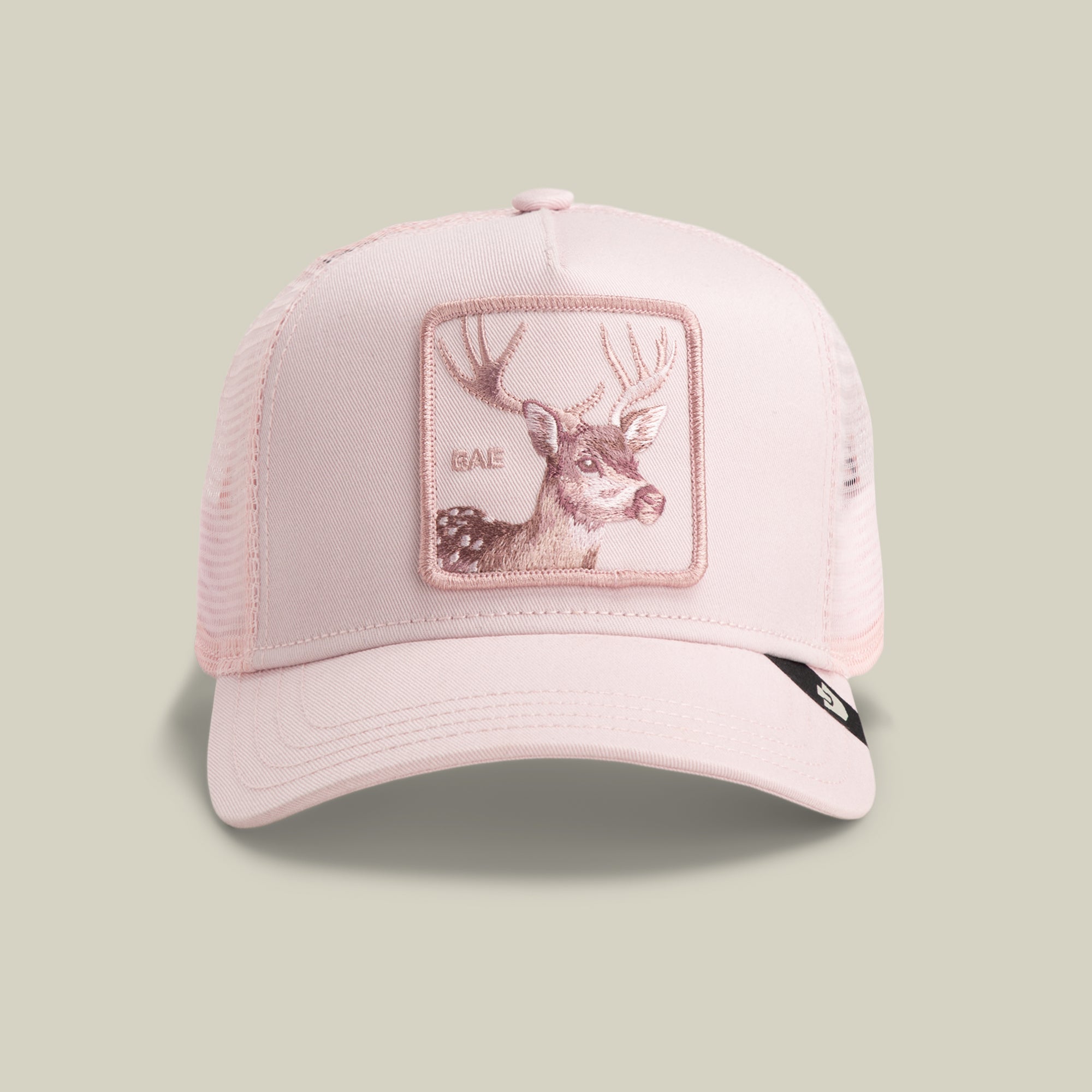 The Goorin Bros. Mirage Bae trucker hat in WHISPER features a mesh design with a deer patch and "BAE" embroidered on the front panel.