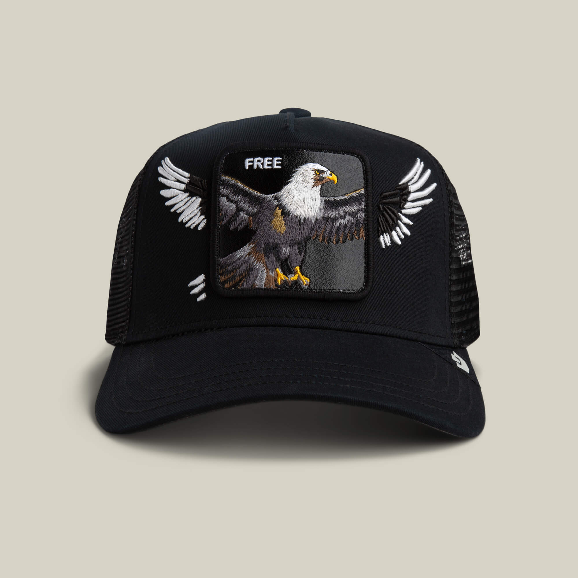 The Goorin Bros. Wings Free hat in VOID features a mesh back and an embroidered bald eagle with "FREE" above it on the front patch.