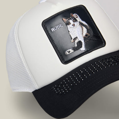 The Goorin Bros. "R U Done Eating?" trucker hat features white and black panels with a front patch of an embroidered cat and the word RUDE—a bold accessory to elevate your look.