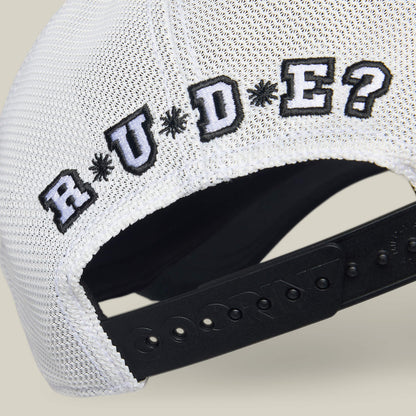 Close-up of the back of a white mesh baseball cap by Goorin Bros. with "R U Done Eating?" embroidered in black and white above the adjustable strap, challenging your vibe and manners.