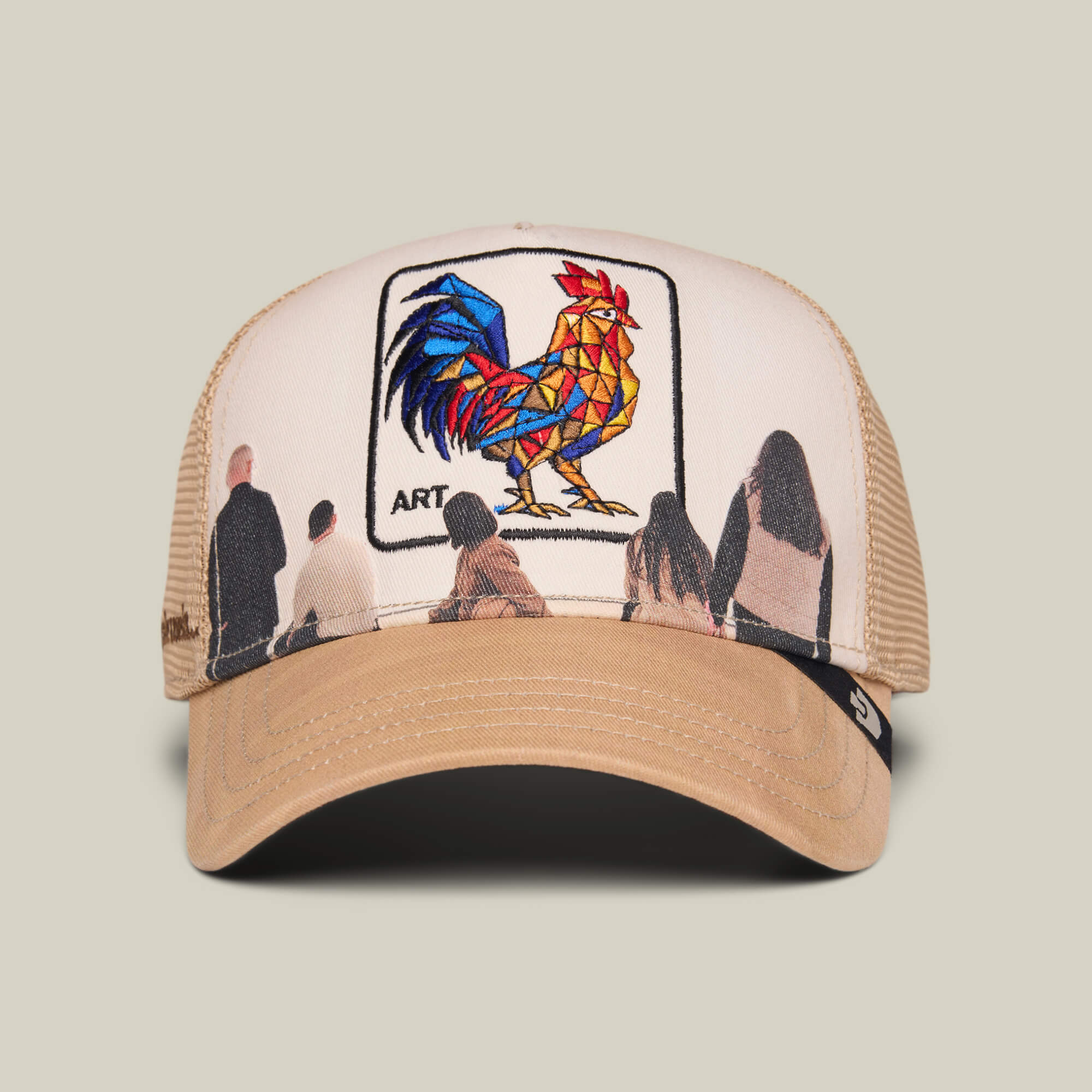 The Goorin Bros. "Hey, I Like It! Picasso!" hat in CHALK features a geometric rooster with the word ART, inspired by Picasso's cubist style, with digital print embroidery and images of people admiring the design.