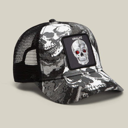 The Bone Head Unalive by Goorin Bros. is a bold black-and-white trucker hat featuring a breathable black mesh back, striking white skull graphics, and a front patch with a skull sporting red eyes and the word “UNALIVE.” Inspired by iconic street style, this edgy accessory is perfect for fans of Goorin Bros.’ distinctive look.