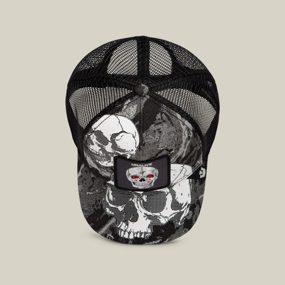 Introducing the Goorin Bros. Bone Head Unalive trucker hat: a black mesh baseball cap with striking white and gray skull graphics, accented by a front patch featuring a skull with red eyes and “UNALIVE” text. Designed for comfort, this Goorin Bros. hat offers a breathable mesh back ideal for all-day wear.