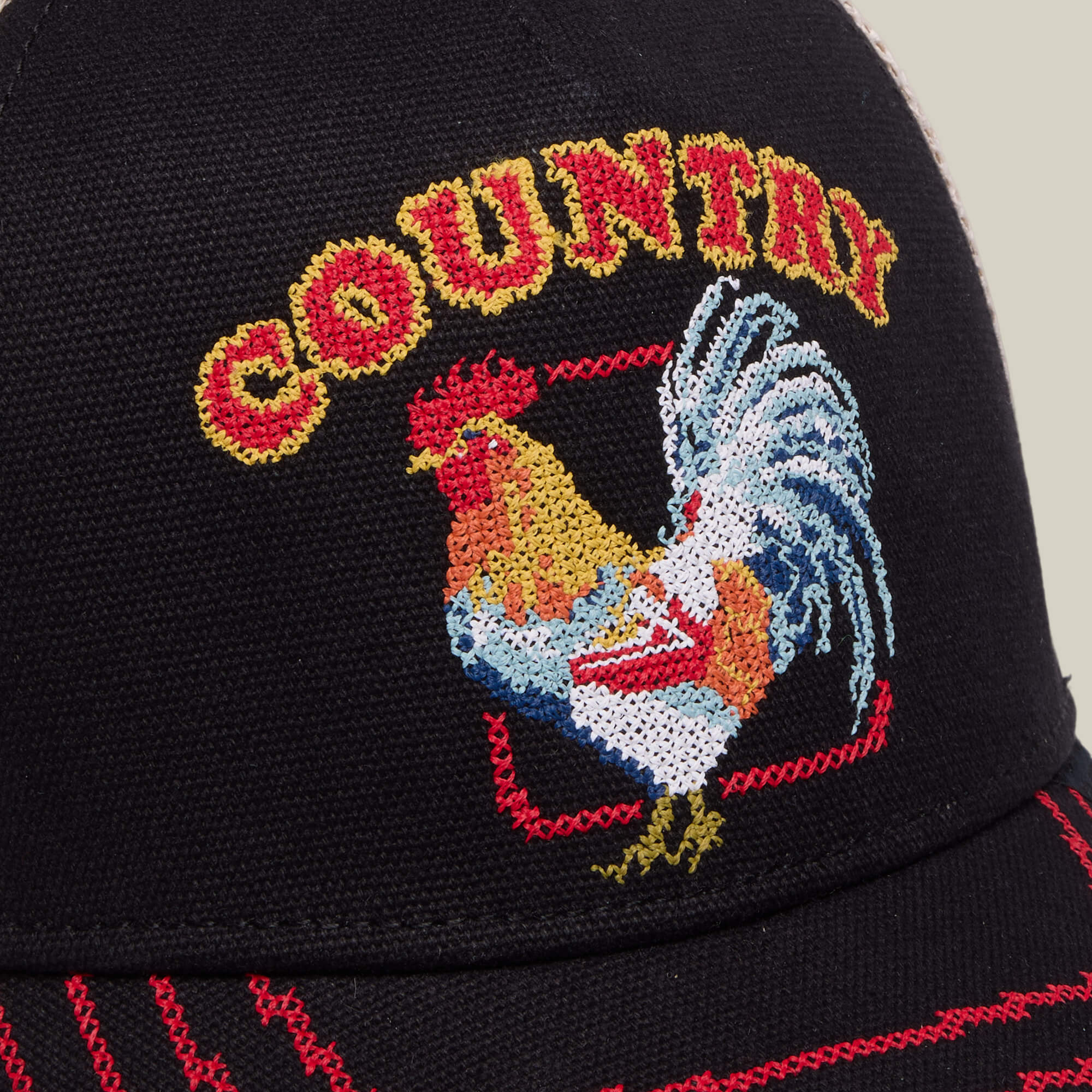 The "Middle of No Where" cap by Goorin Bros. is a black hat with an embroidered rooster and COUNTRY in yellow and red above it—ideal for fried chicken and home cooking fans.