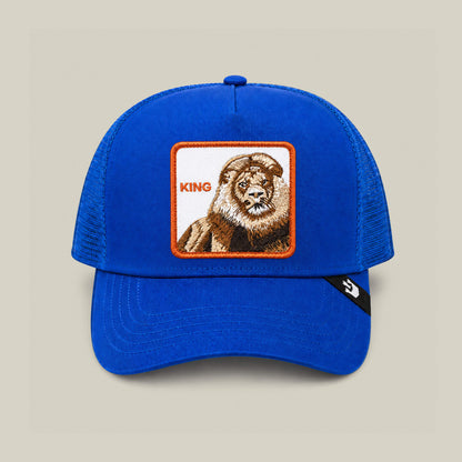 Pre-order the Goorin Bros. Empire State of Mind cap in royal blue, featuring a lion patch and KING embroidery on the front—perfect for showing your regal style.