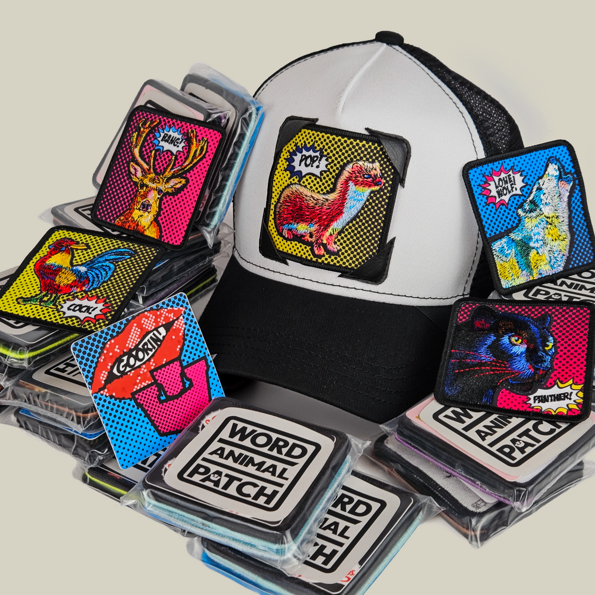 Black and white Popart Patch Pack with GB Patch Corner Trucker hat decorated with a variety of POPArt animal patches.