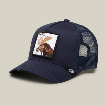 The Goorin Bros. Karlsson Moose is a navy blue trucker hat with a mesh back and a front patch featuring an embroidered moose and “KARL”—the perfect lid for Erik Karlsson fans.
