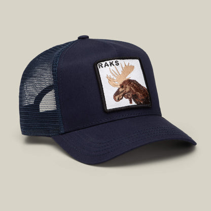The Goorin Bros. Rakell Moose is a limited-edition navy blue mesh trucker cap with a front patch showcasing a moose graphic and the word RAKS, inspired by Rickard Rakell.