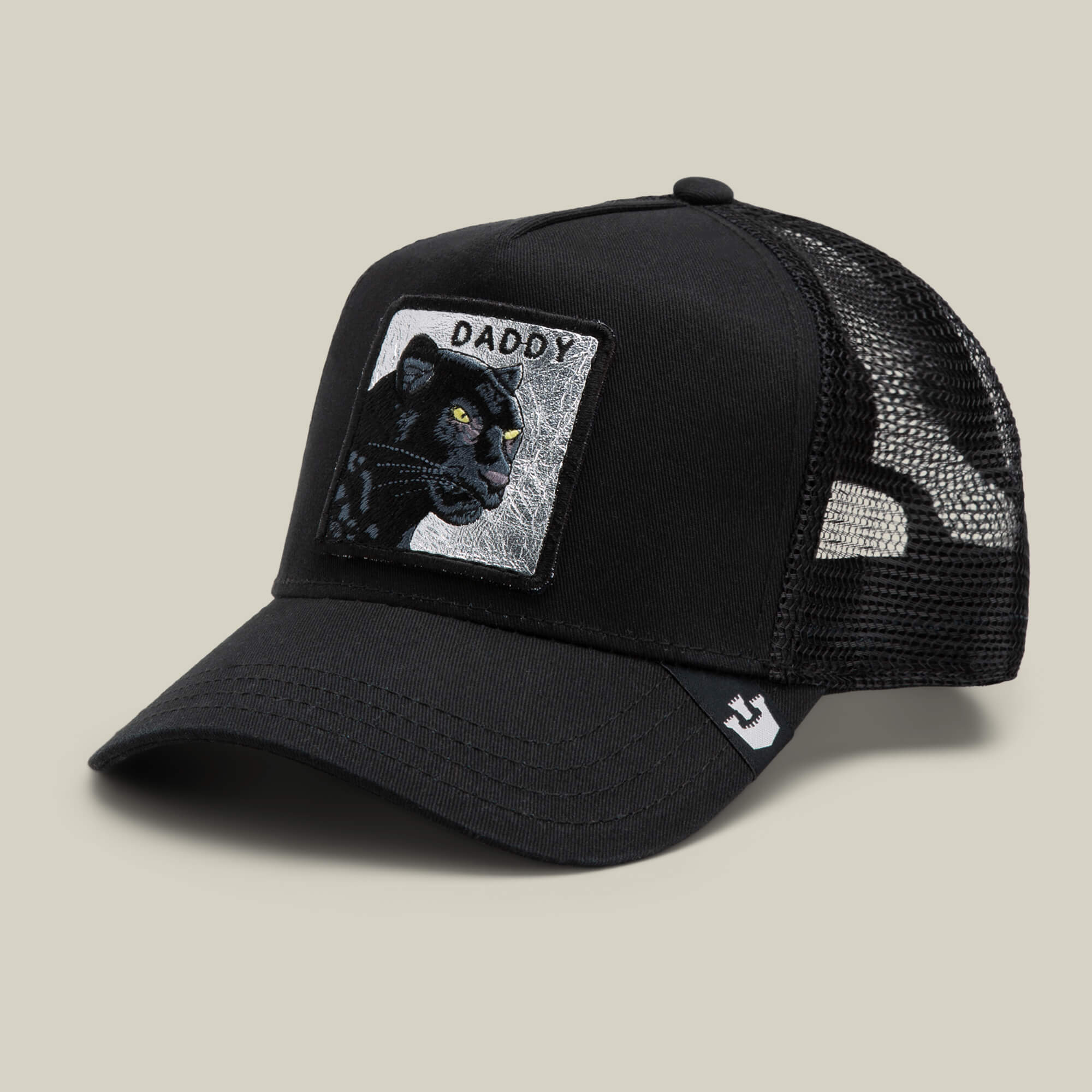 The Daddy Panther by Goorin Bros. is a black trucker hat with a mesh back, platinum panther patch, and "DADDY" embroidered above—one of our most-wanted styles.