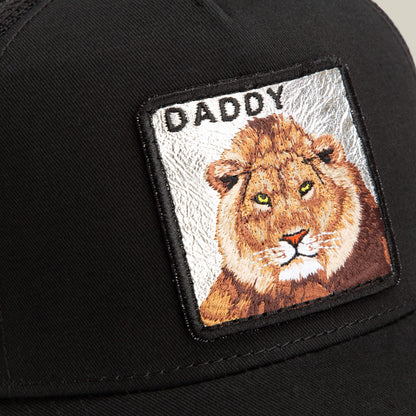 The Goorin Bros. Daddy King is a black mesh cap with a lion patch and "DADDY" embroidered above it. Limited edition for true King Daddy style.