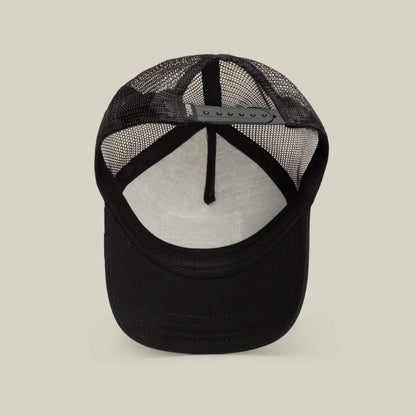 Shown from below, the Daddy King black mesh trucker cap by Goorin Bros. highlights its adjustable strap and white inner sweatband. This limited edition design offers comfort and style with breathable mesh for all-day wear.