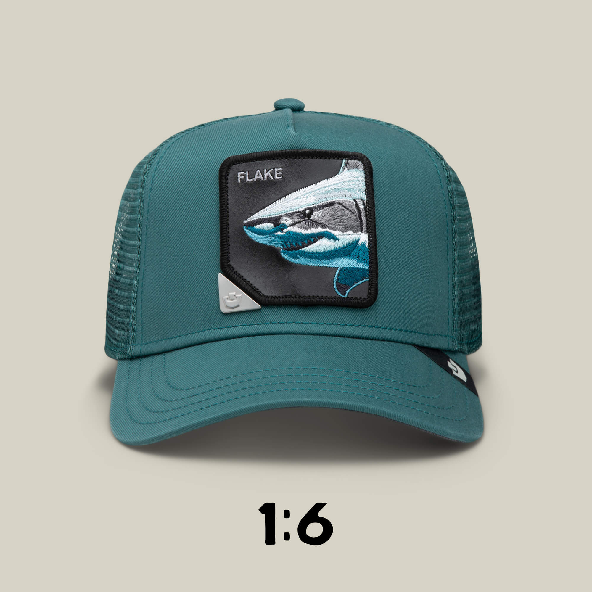 Teal trucker hat by Goorin Bros. with mesh back, showcasing a shark "FLAKE" patch on the front. It's Blind Box 1: U R WUT U EET, part of a mystery animal hat collection (1:6 chance per box).