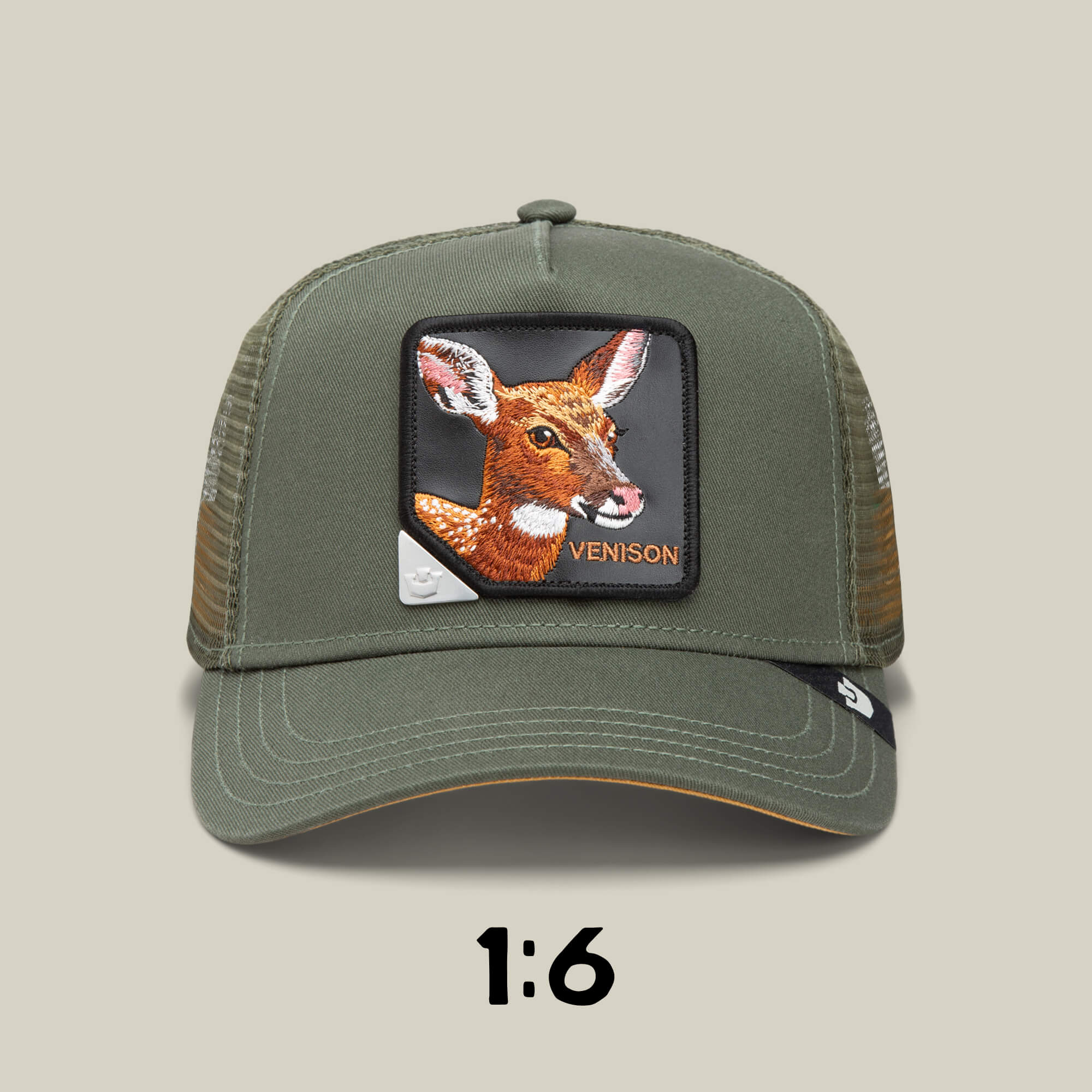 An olive green mesh baseball cap by Goorin Bros., from the Blind Box 1: U R WUT U EET series, features a front patch with a deer's head and "VENISON," shown on a beige background with "1:6" below the cap.