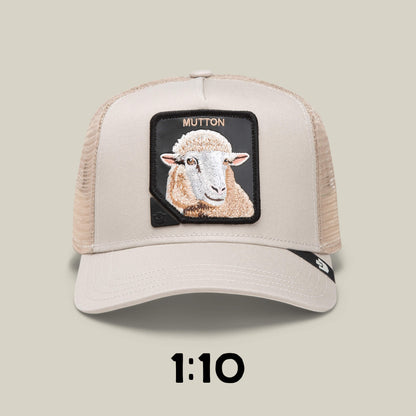 A beige Goorin Bros. Blind Box 1: U R WUT U EET trucker hat features a mesh back, a sheep "MUTTON" patch, and the number 1:10 below, adding unique mystery animal charm.