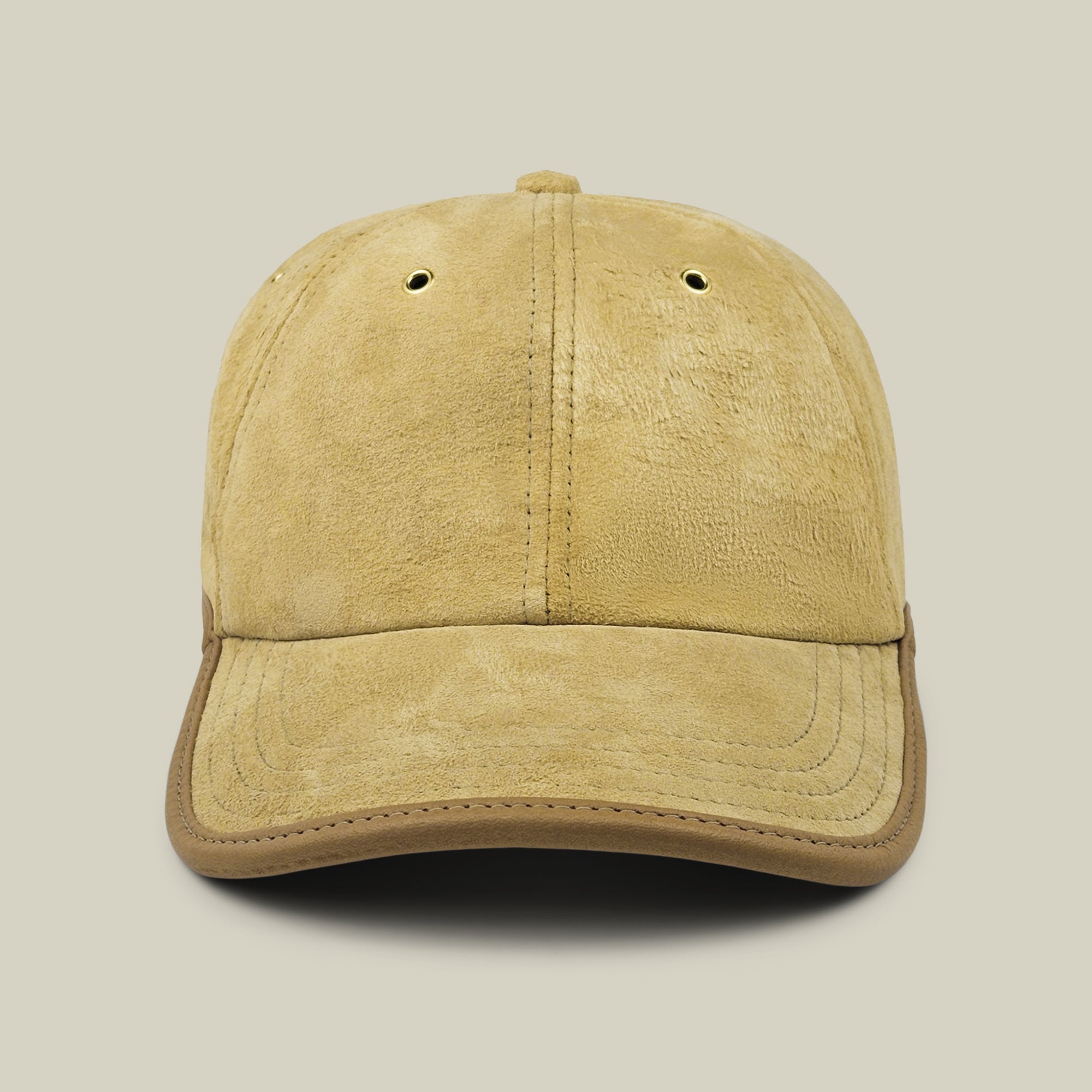 Front view of the Goorin Bros. Steiner cap in Khaki Tan, featuring a curved brim and two ventilation holes on the crown, set against a plain beige background.