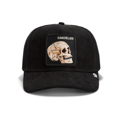 The Goorin Bros. Bold Suede Skull is a black limited edition hat featuring an embroidered skull patch with "CANCELLED" above it.