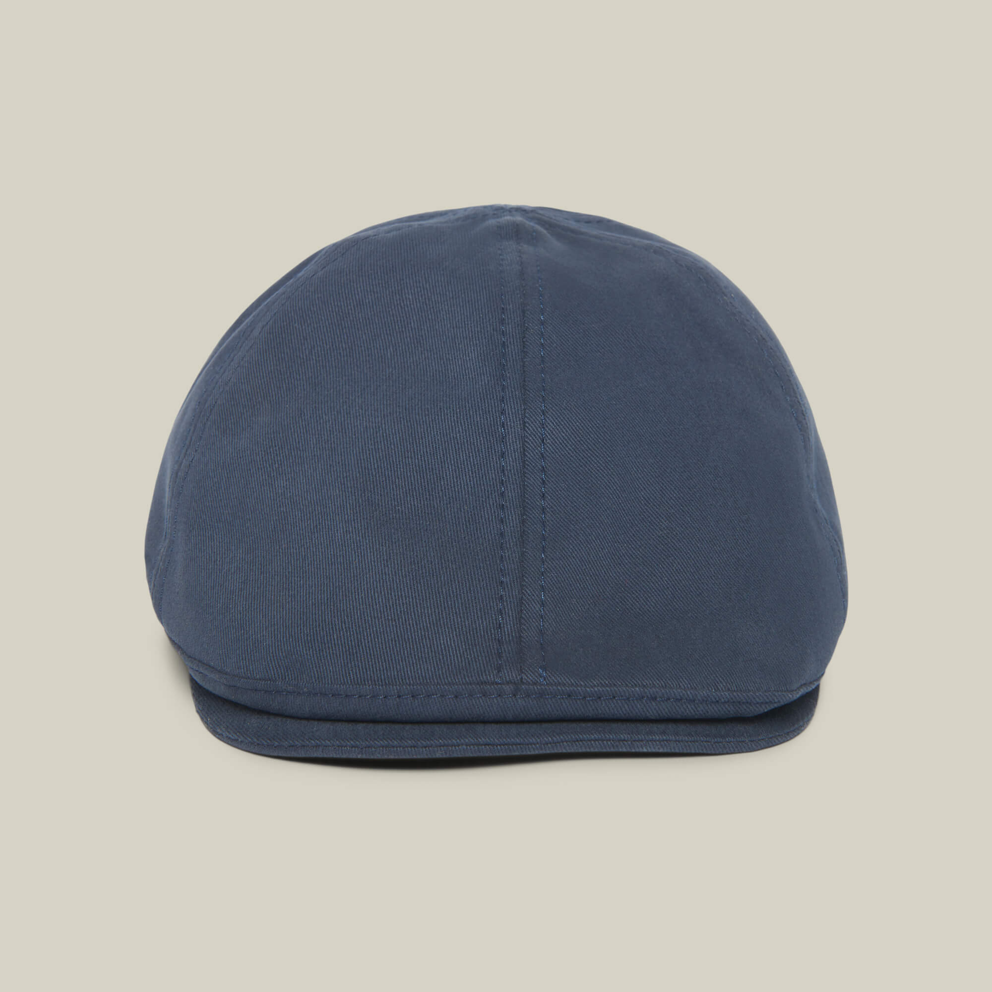 The Goorin Bros. Murray Way is a blue flatcap, made in the USA from 100% cotton, shown from the front on a plain beige background.