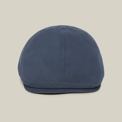 The Goorin Bros. Murray Way is a blue flatcap, made in the USA from 100% cotton, shown from the front on a plain beige background.