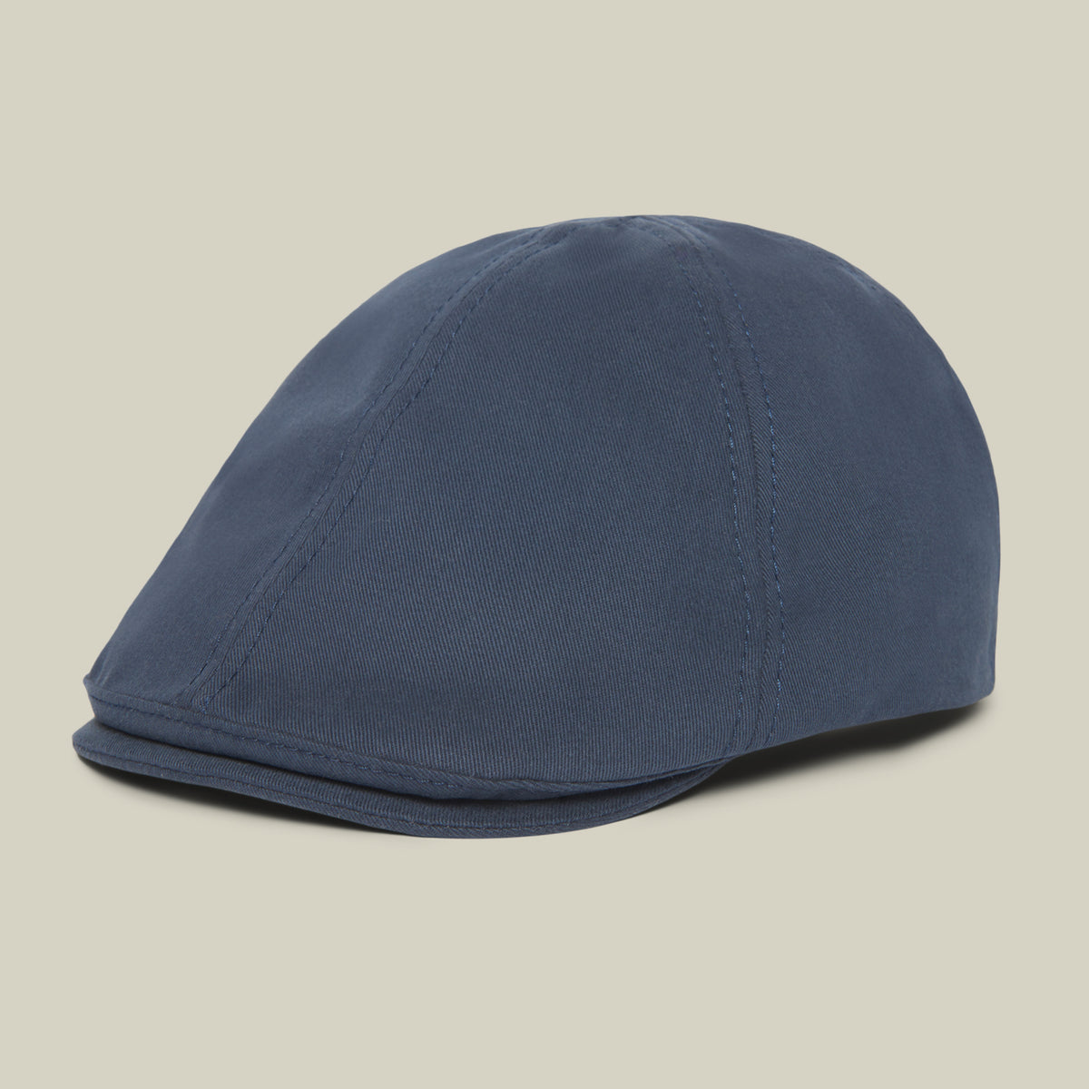 The Goorin Bros. Murray Way is a navy flatcap crafted in the USA from 100% cotton, featuring visible stitching and photographed against a plain light background.