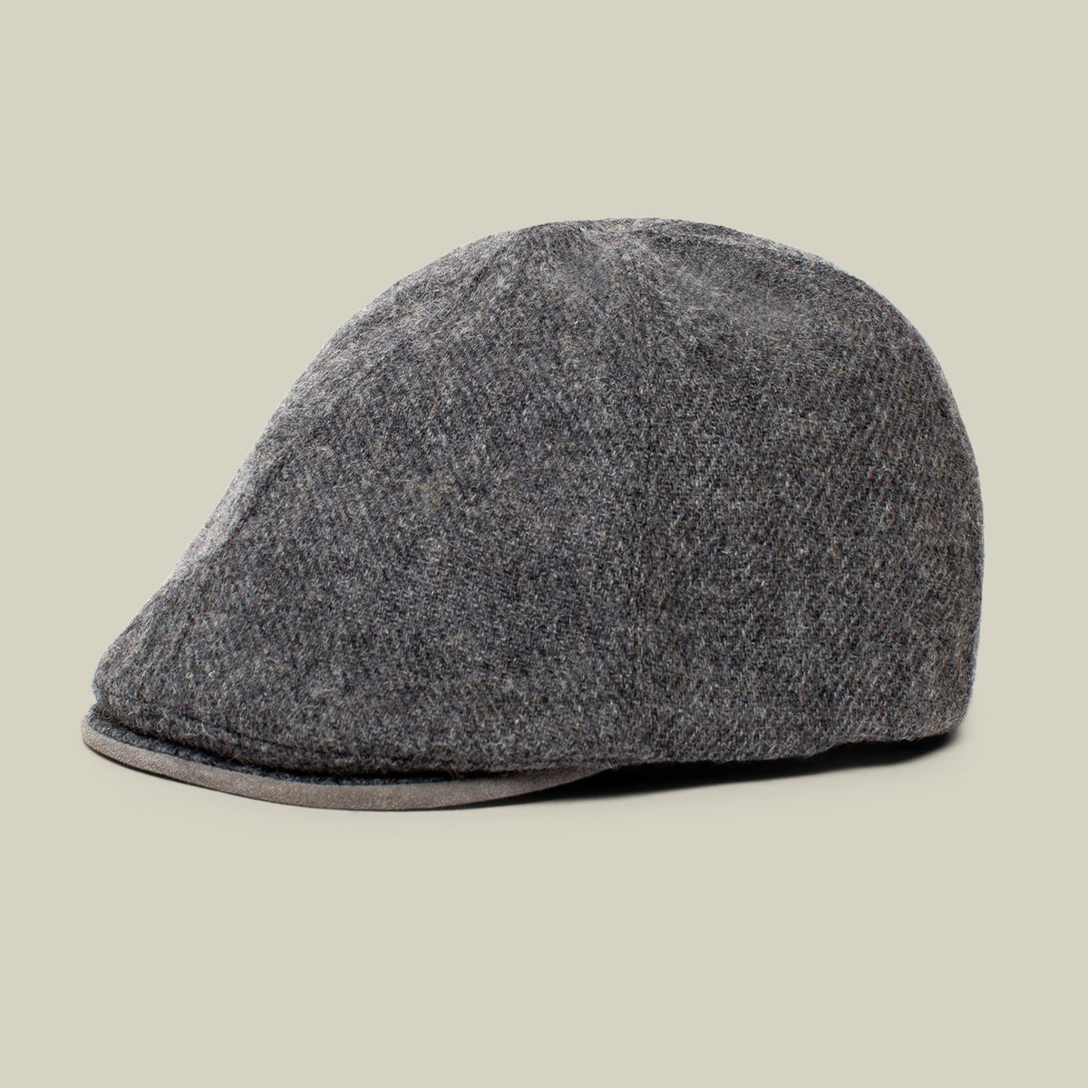 The Goorin Bros. “Ronald Amos” cap, featured here in charcoal, is a sophisticated six-panel hat with a two-inch brim, displayed against a plain beige background—making it the ideal choice for everyday wear and any occasion.