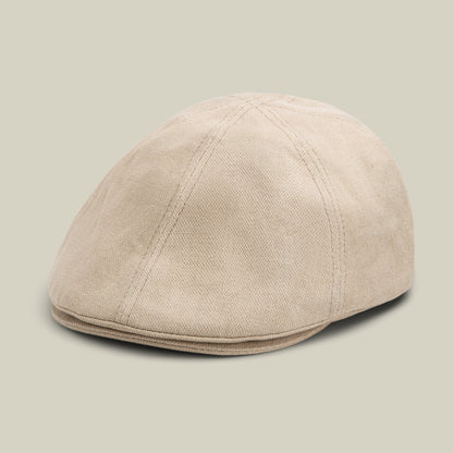 BISCUIT-colored Noisy Benjamin Paul 6 panel flatcap by Goorin Bros., crafted from textured fabric and displayed against a plain light background.