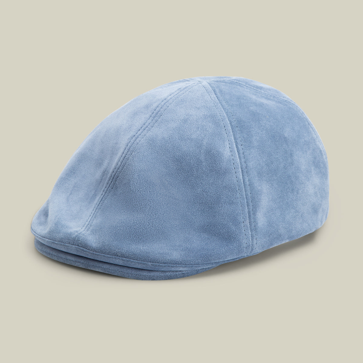 A Goorin Bros. Cushy Benjamin Paul flatcap in SHADOW is shown against a plain beige background.